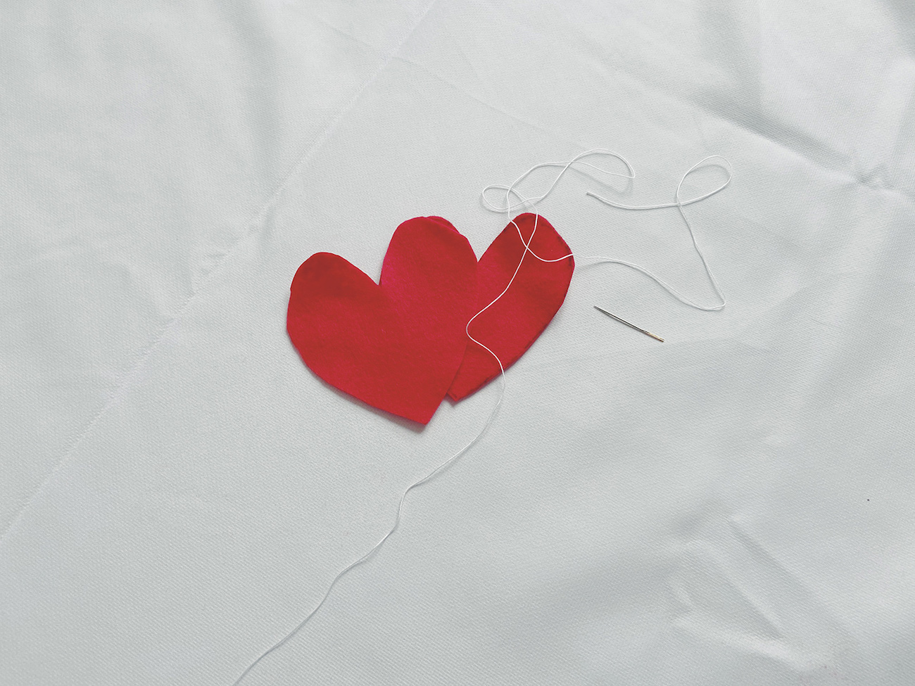 Sewing time heart and thread