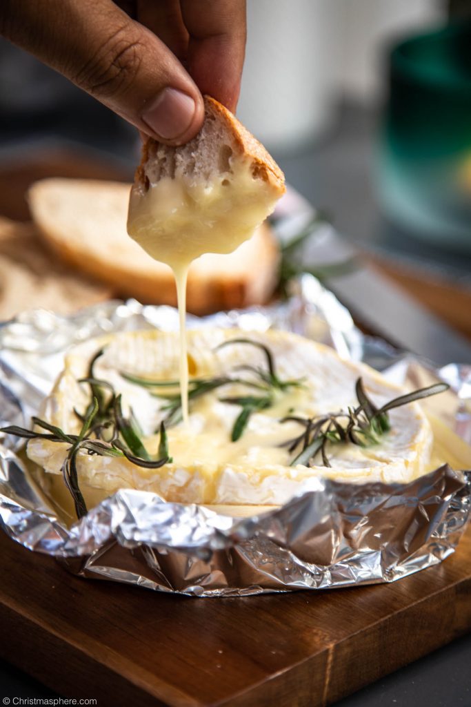 dipping on gooey camembert