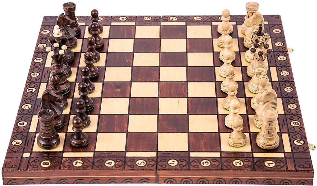 Luxury wooden chess board with pieces